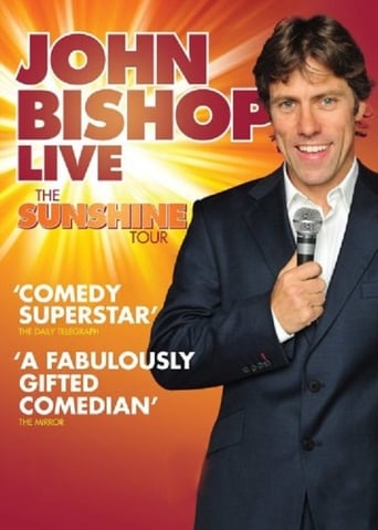 Following the release of the fastest-selling debut stand-up DVD ever (not to mention the biggest seller of last year), John Bishop returns with his new live DVD. Seen by over 400,000 people across the UK, Sunshine was filmed live at Liverpool's Echo Arena on the last night of his sell-out tour of the same name. The combination of John's ability to keep the laughs coming along with his unique brand of observational humour, his undeniable charm and unrivalled gift of creating a relaxed atmosphere means that the feel good factor of spending an evening in his company is absolutely priceless. In this show John shares anecdotes about the ways in which his life has changed because of fame, he confesses to what his kids really think of him and he explains why this is his time in the Sunshine.
